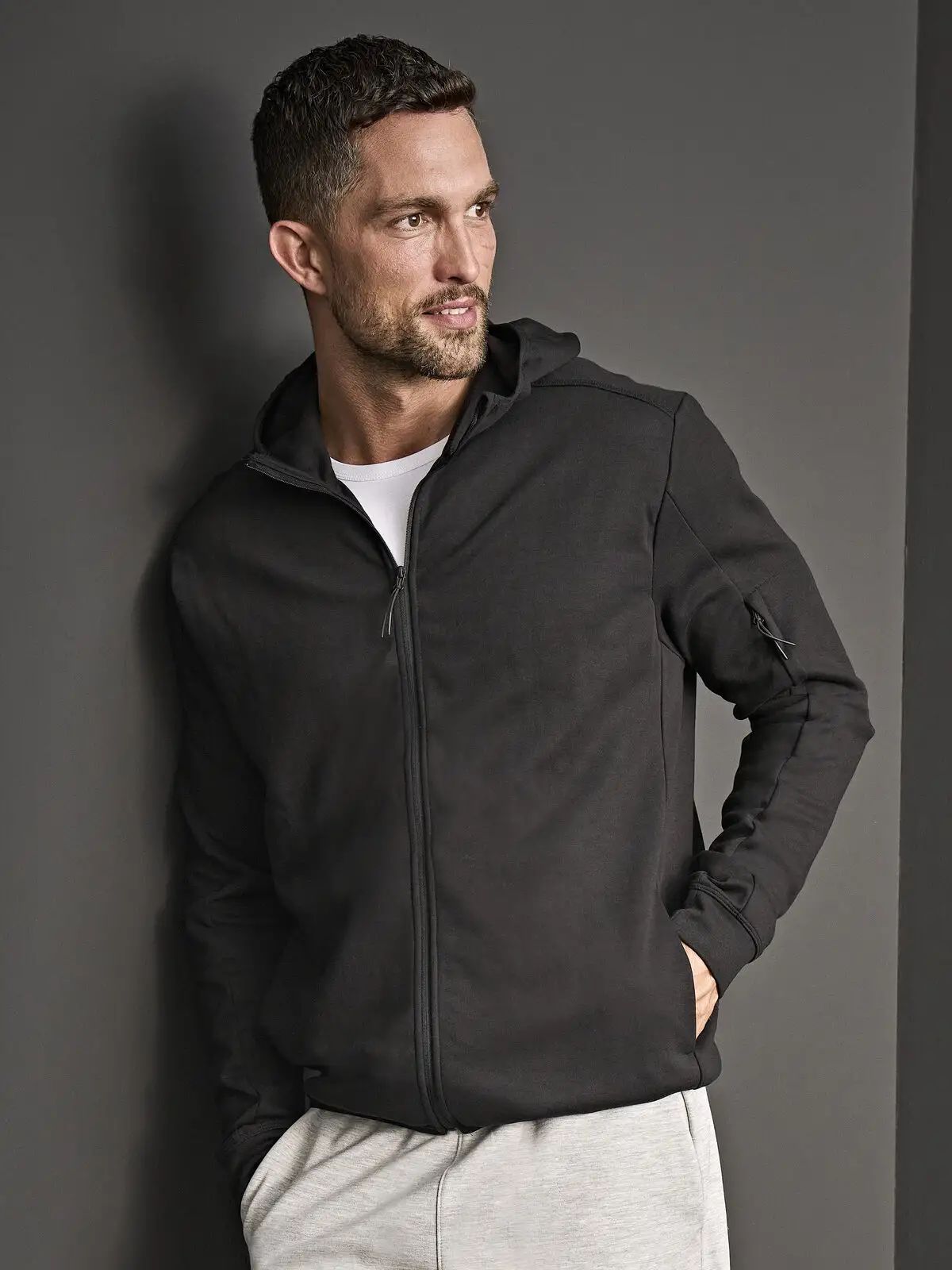 Felpa in interlock con zip e cappuccio e due tasche frontali - Tee Jays - TJ5706
