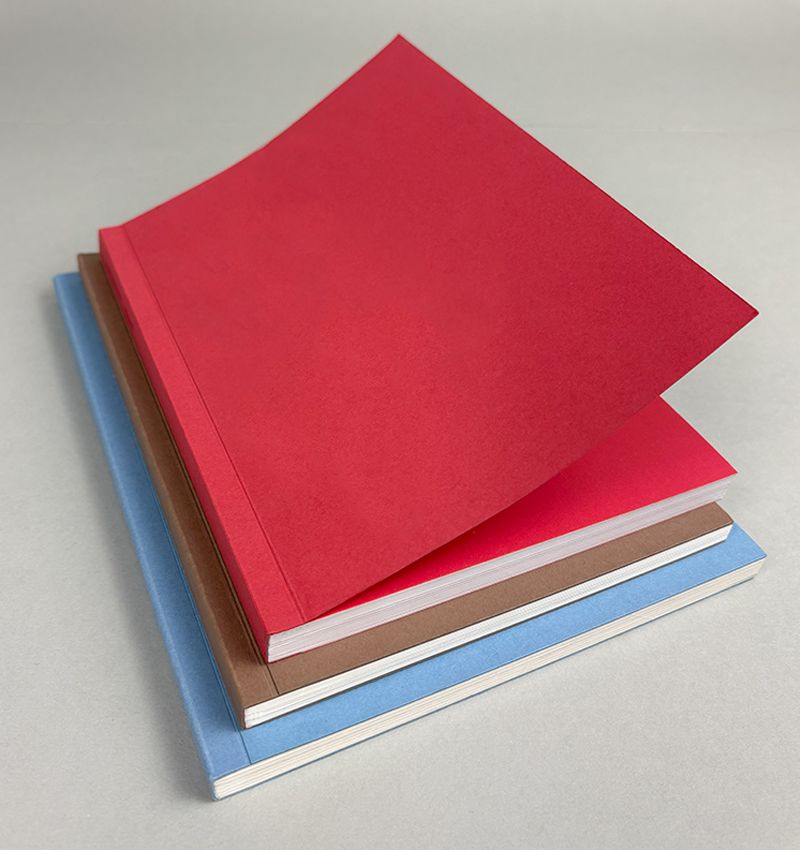 Libri fotografici con Brossura Pur e copertina colorata