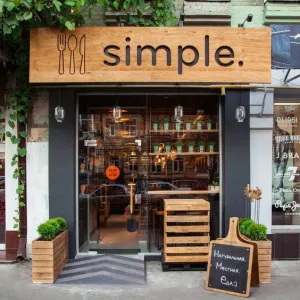 Insegna in Dibond stampata effeto legno con logo intagliato e retroilluminato